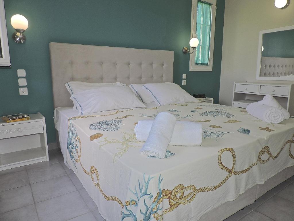 Postel nebo postele na pokoji v ubytování Villa Theodora