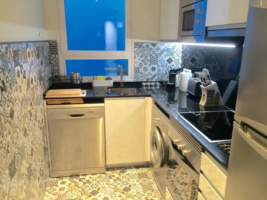Kuchyňa alebo kuchynka v ubytovaní Passeig de Gracia Apartment