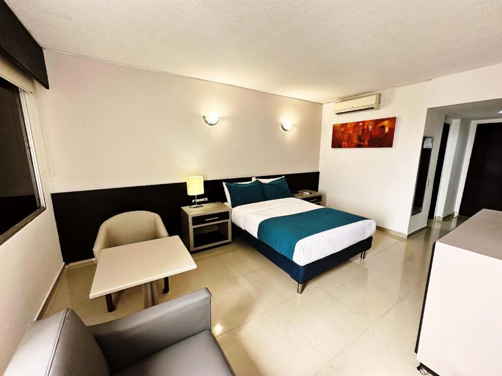 Postel nebo postele na pokoji v ubytování Hotel Tonchalá