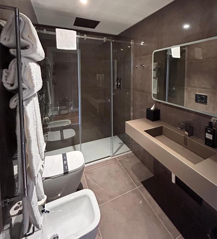 Łazienka w obiekcie Caruso Place Boutique & Wellness Suites