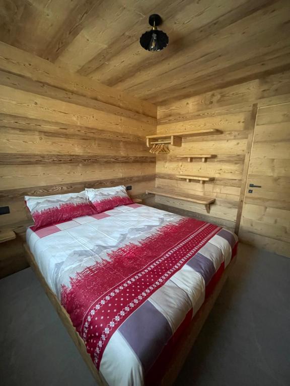 Voodi või voodid majutusasutuse Sabbionaccio Apartments & Spa toas