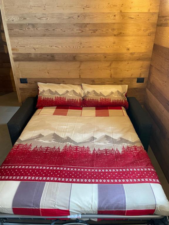 Voodi või voodid majutusasutuse Sabbionaccio Apartments & Spa toas