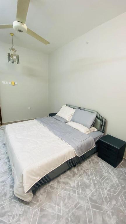 Postel nebo postele na pokoji v ubytování شقق القبس