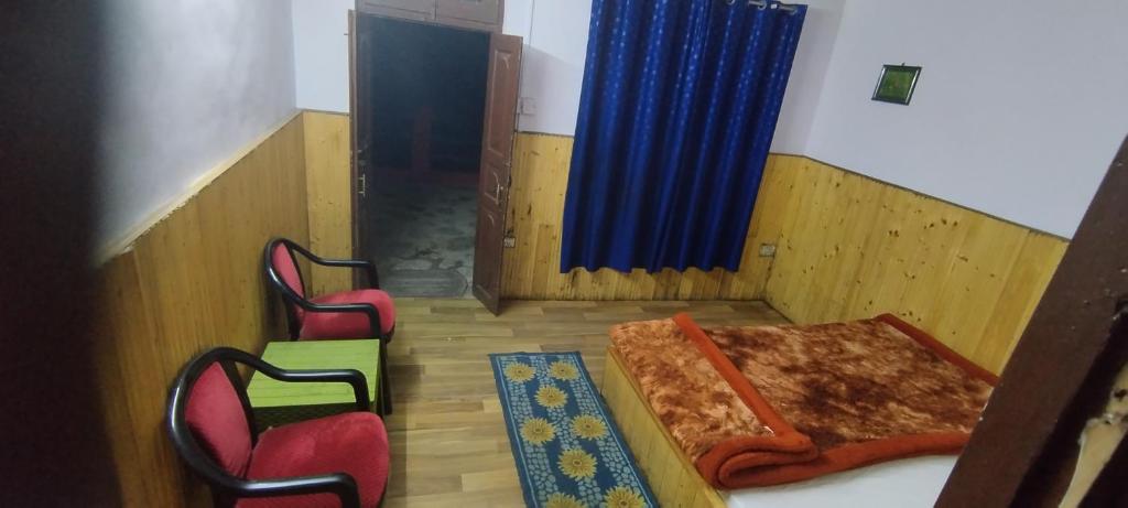 Postel nebo postele na pokoji v ubytování Khem raj