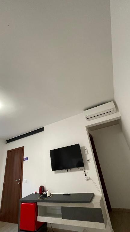 TV a/nebo společenská místnost v ubytování Casa Laguna Escape