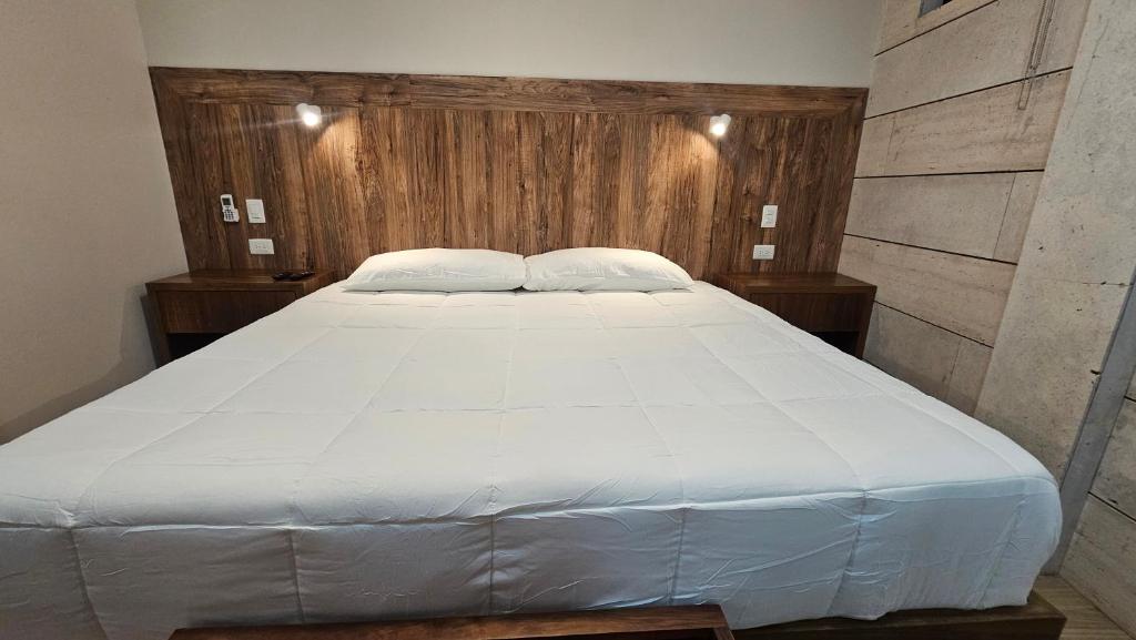Postel nebo postele na pokoji v ubytování Xoza Hotel Urban Escape