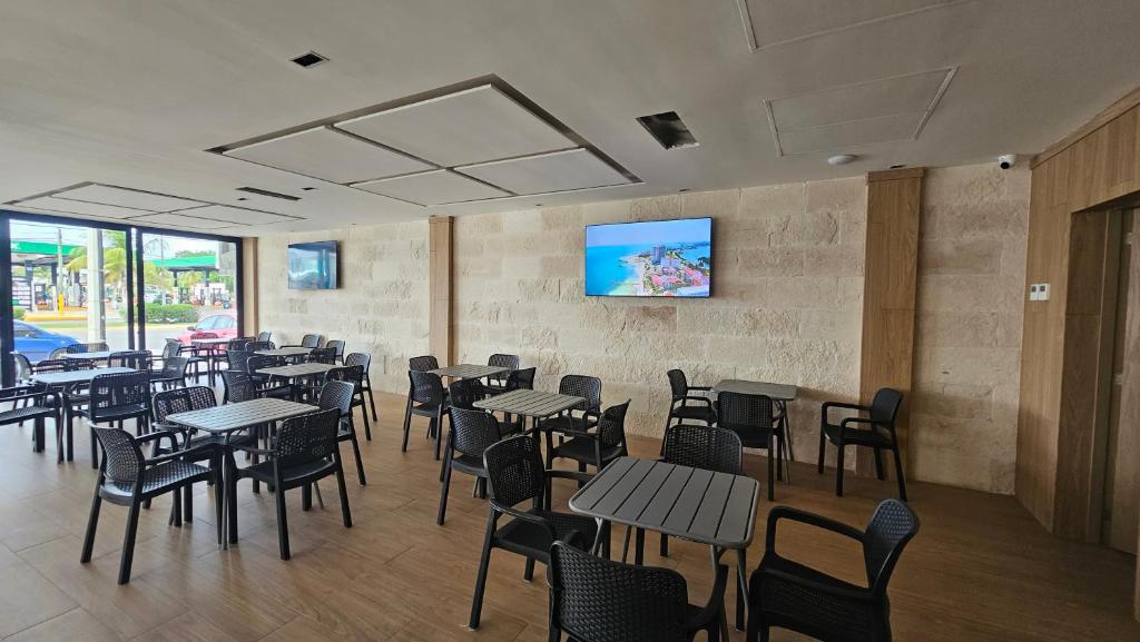 TV a/nebo společenská místnost v ubytování Xoza Hotel Urban Escape
