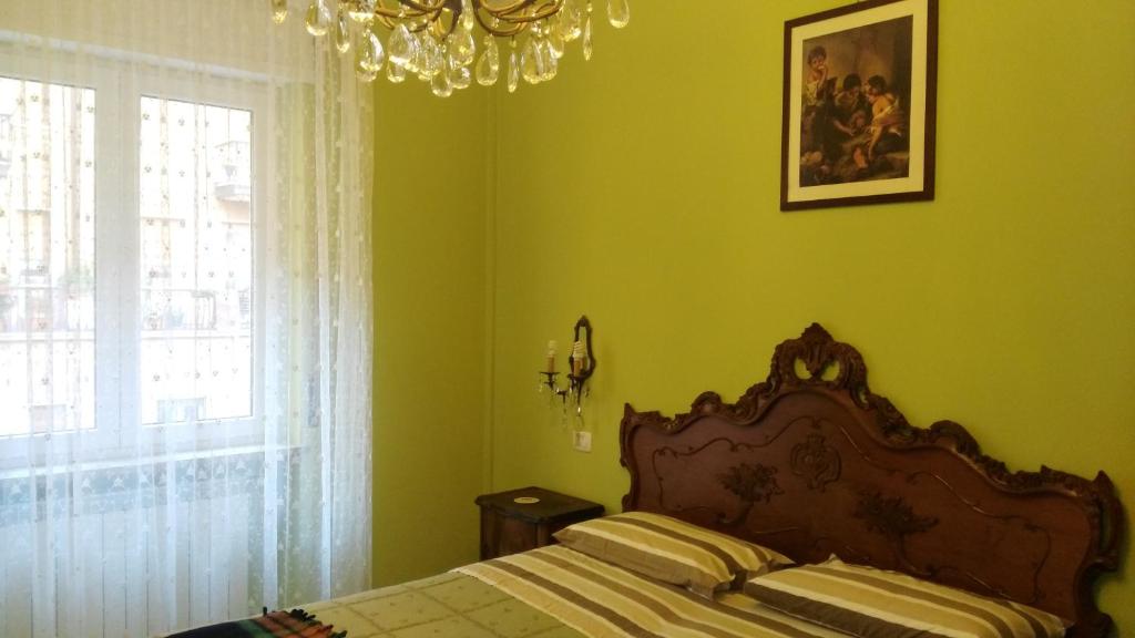 Postel nebo postele na pokoji v ubytování locazione turistica Sole