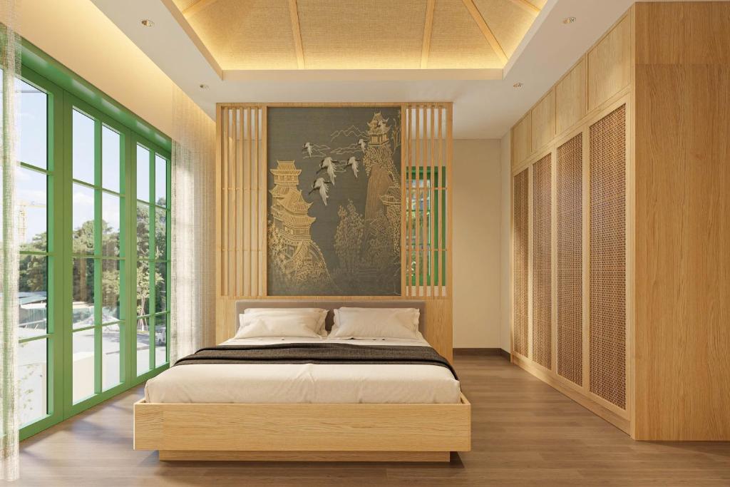 Giường trong phòng chung tại Luna Sol Villas - Dedicated Care Until Check Out