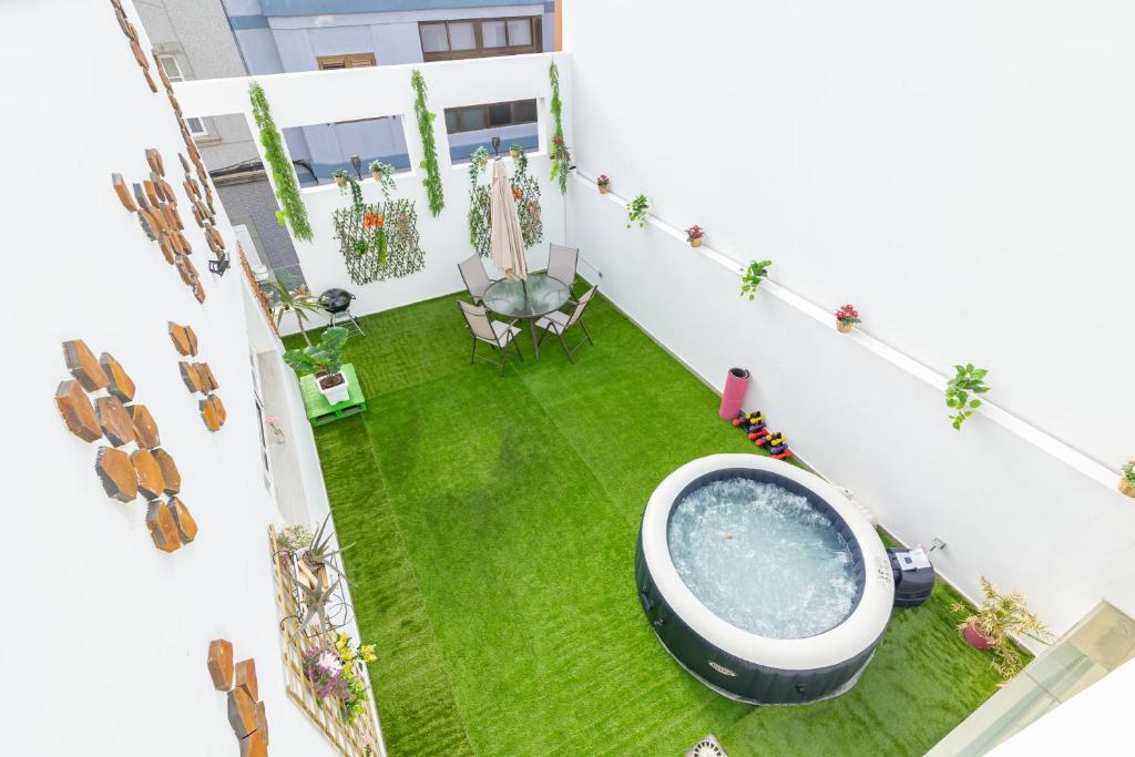 Bazén v ubytování Garden House - La Isleta nebo v jeho okolí