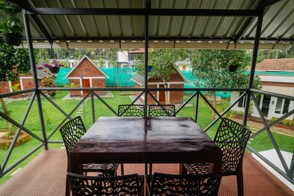 Balkón nebo terasa v ubytování Misty Forest Resort Wayanad