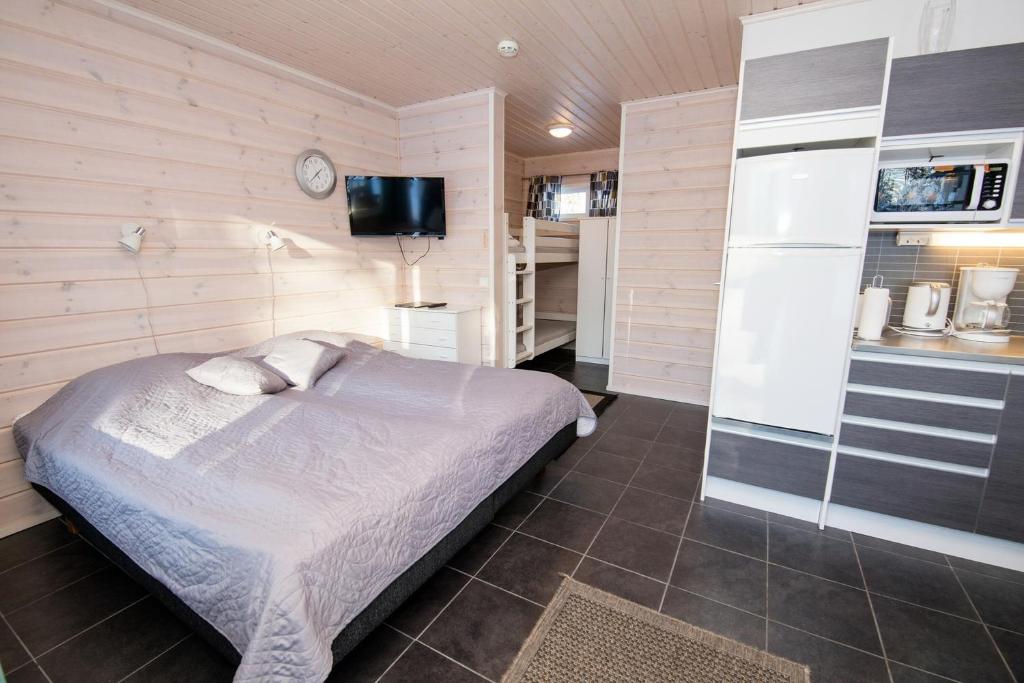 Kuchyň nebo kuchyňský kout v ubytování Kajaani Cottages