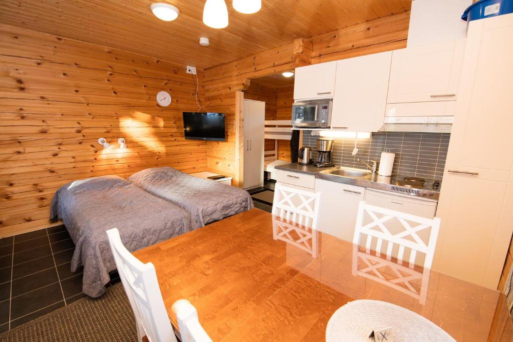 Kuchyň nebo kuchyňský kout v ubytování Kajaani Cottages