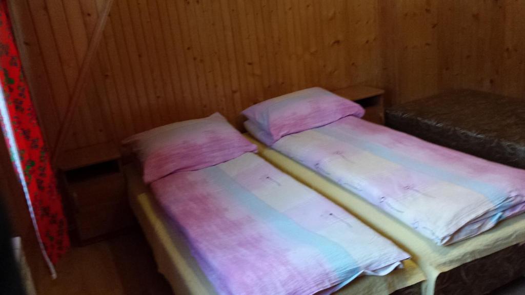 Posteľ alebo postele v izbe v ubytovaní Pokoje Zakopane