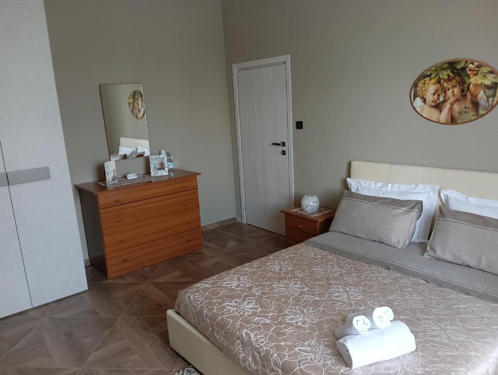 Postel nebo postele na pokoji v ubytování B&B da Giusy