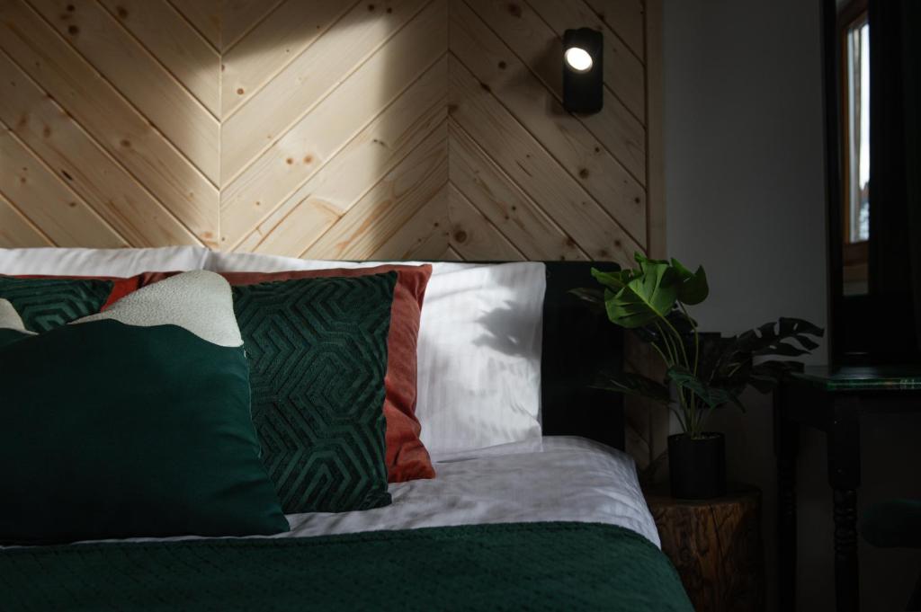 Posteľ alebo postele v izbe v ubytovaní Apartament Stryszek Alpinistyczny