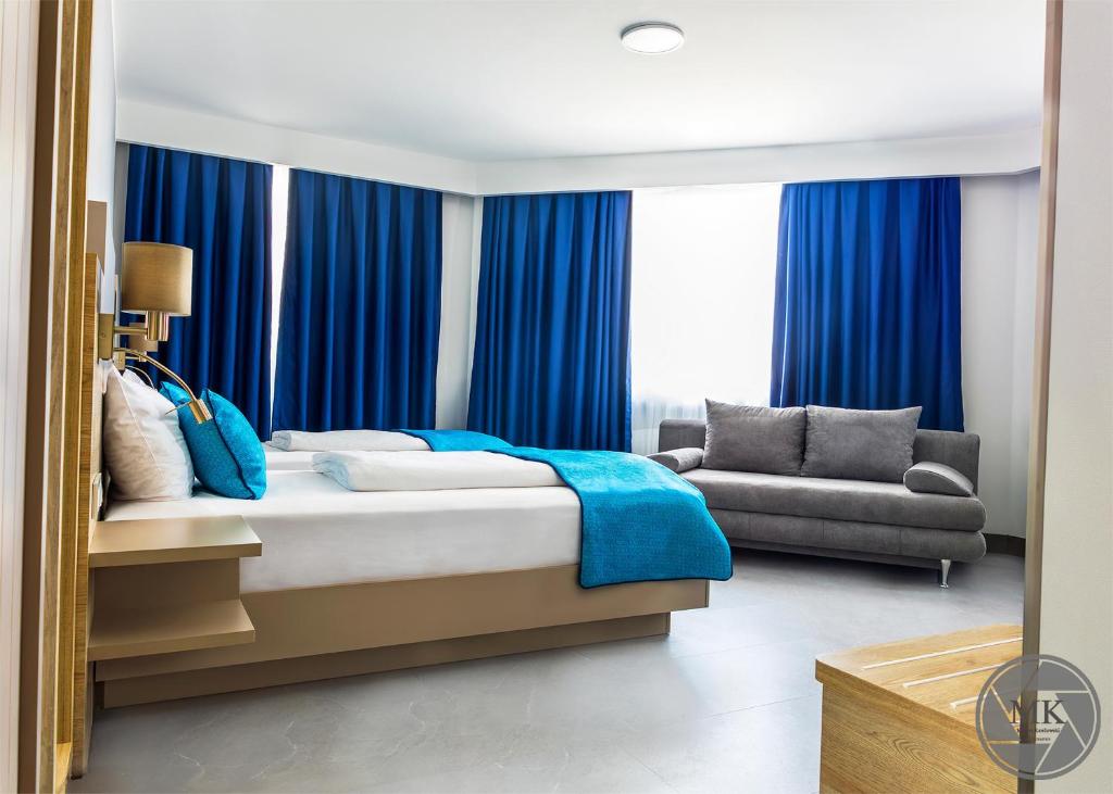 Postel nebo postele na pokoji v ubytování Hotel Atlas Halle