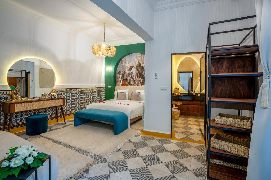 Postel nebo postele na pokoji v ubytování Maison H Kasbah