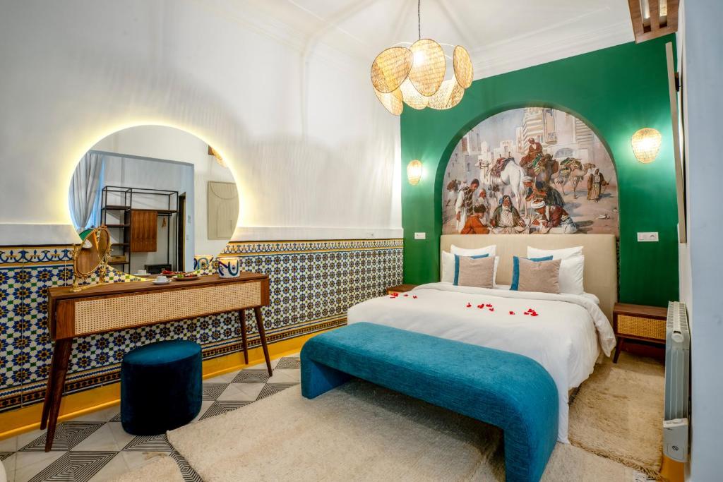 Postel nebo postele na pokoji v ubytování Maison H Kasbah
