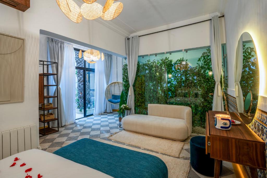 Postel nebo postele na pokoji v ubytování Maison H Kasbah