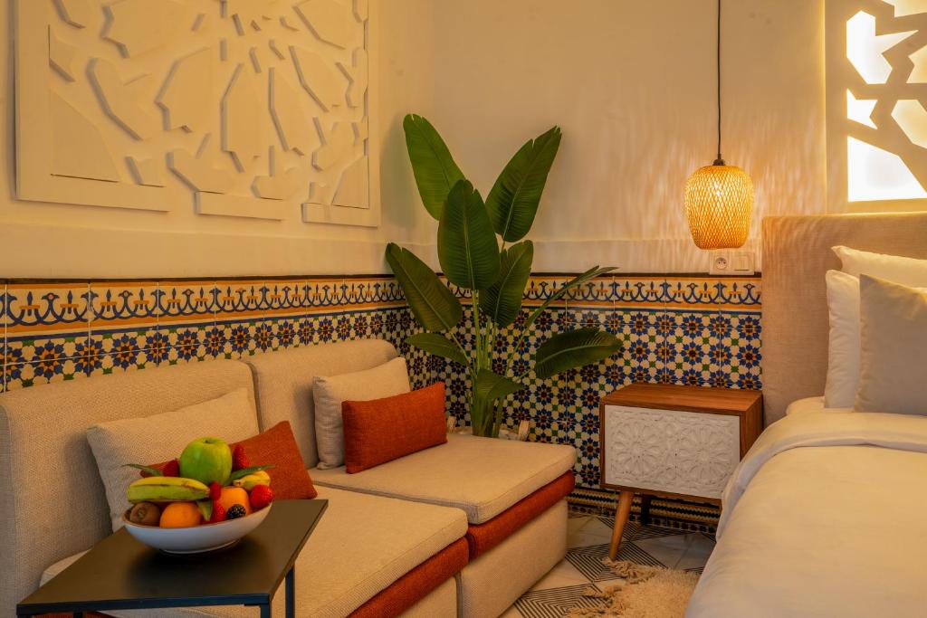 Postel nebo postele na pokoji v ubytování Maison H Kasbah