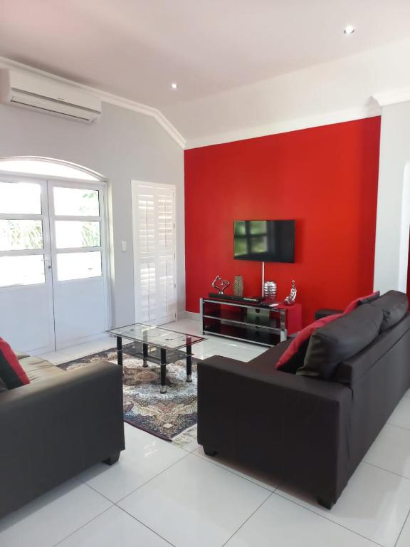 Posezení v ubytování Caribbeans Estates Villa 45 Calypso Drive