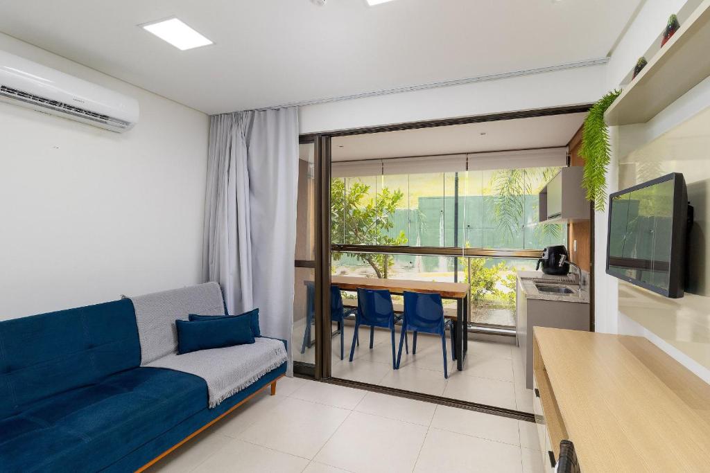 TV a/nebo společenská místnost v ubytování Eco Resort Praia dos Carneiros Apt Beira Mar