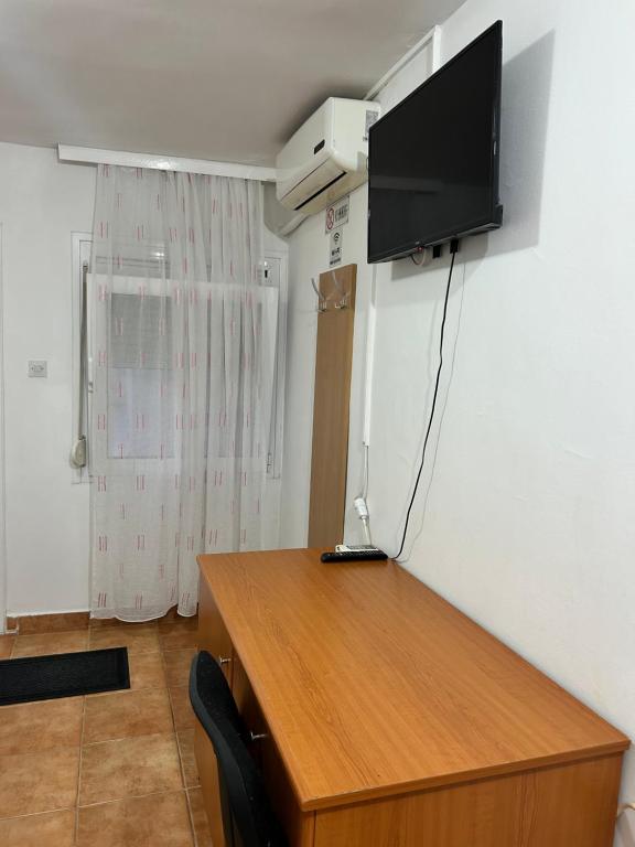 TV a/nebo společenská místnost v ubytování Apartments Jankovic
