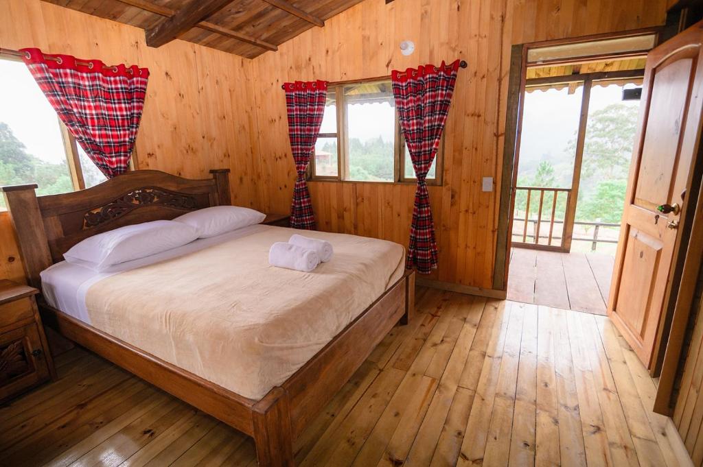 Postel nebo postele na pokoji v ubytování Primavera Ecoalbergue