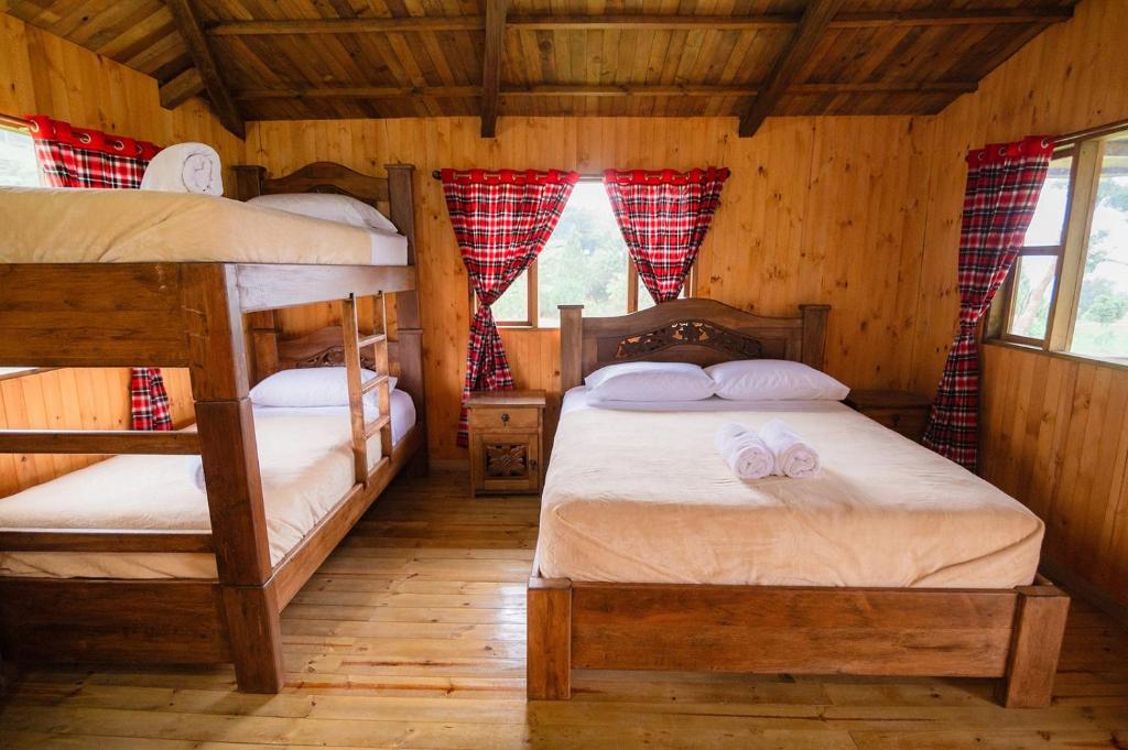 Postel nebo postele na pokoji v ubytování Primavera Ecoalbergue