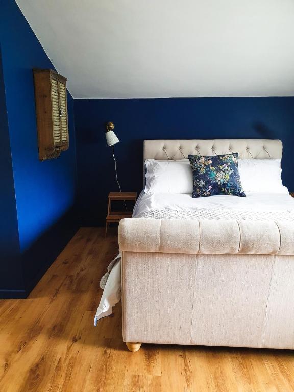 Voodi või voodid majutusasutuse Gavenny Cottage toas