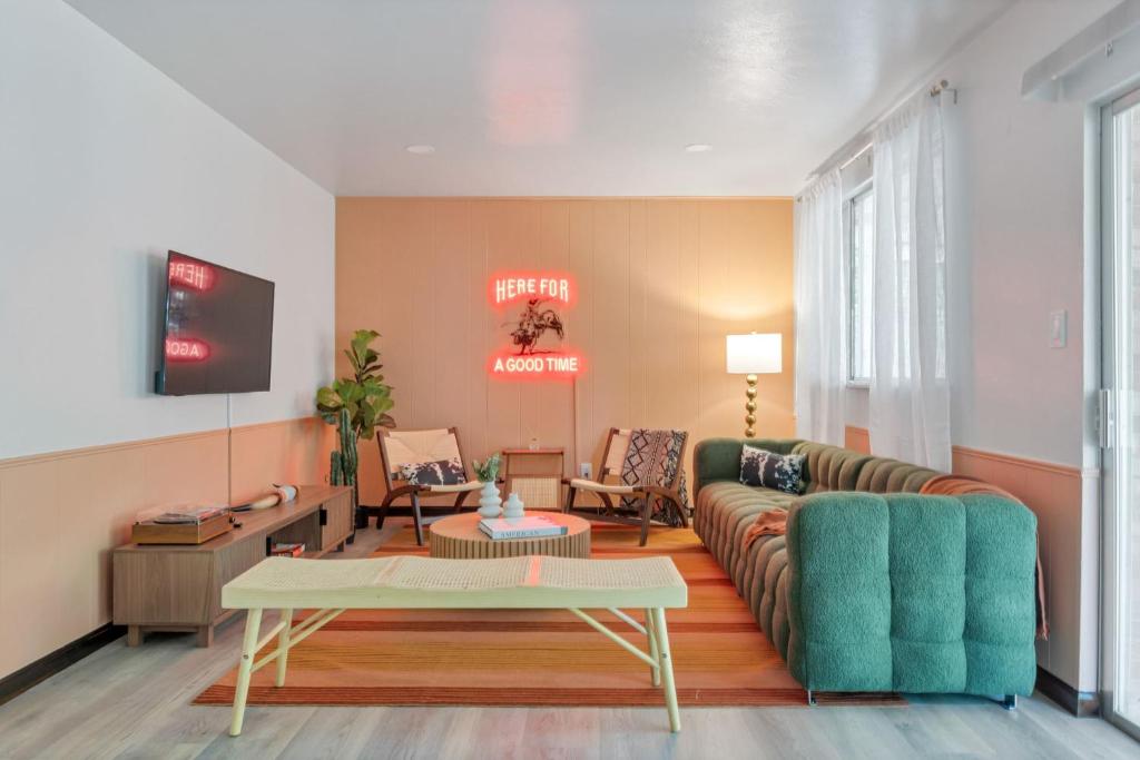 a living room with a couch and a table at Our West Nest, Charming 3 BR-5 Bed - Backyard - Olde Town Arvada in Arvada
