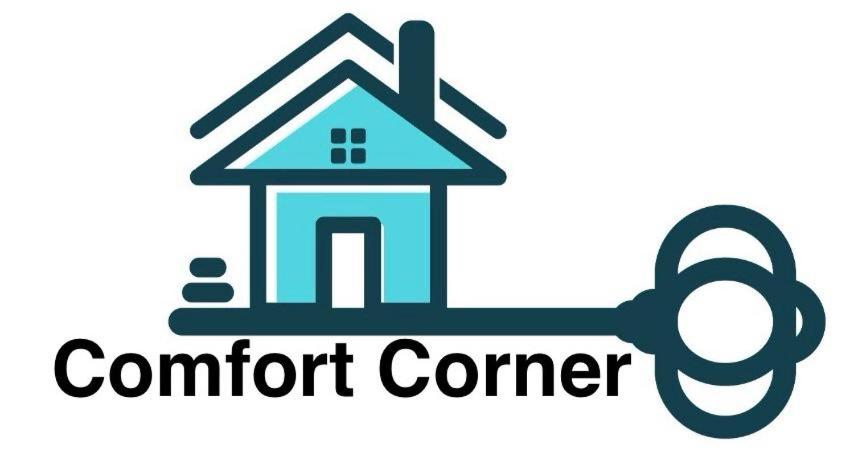 Et logo, certifikat, skilt eller en pris der bliver vist frem på Comfort Corner