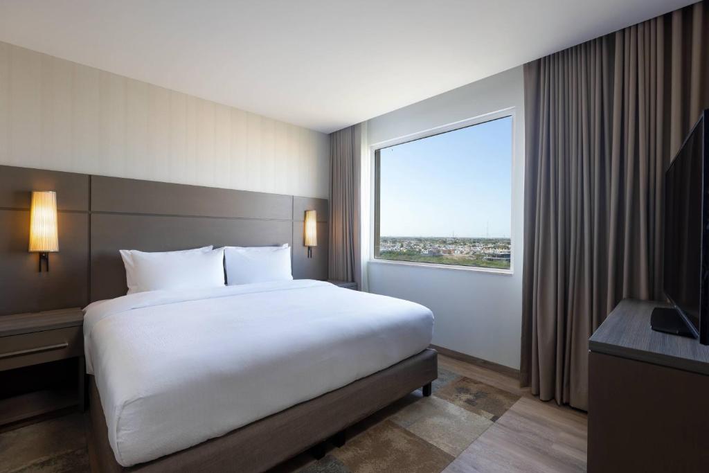 Postel nebo postele na pokoji v ubytování Residence Inn by Marriott Merida