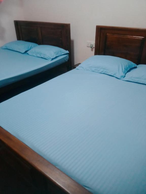 Postel nebo postele na pokoji v ubytování Impress Holiday Home