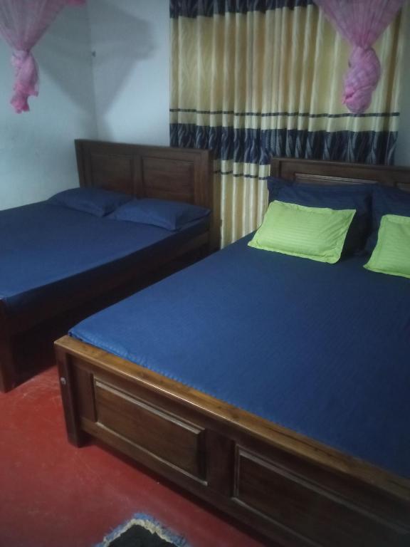 Postel nebo postele na pokoji v ubytování Impress Holiday Home
