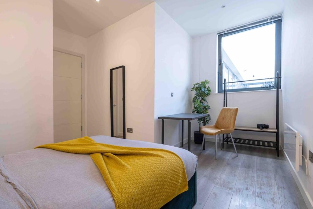 Ένα ή περισσότερα κρεβάτια σε δωμάτιο στο Elegant apartment 1