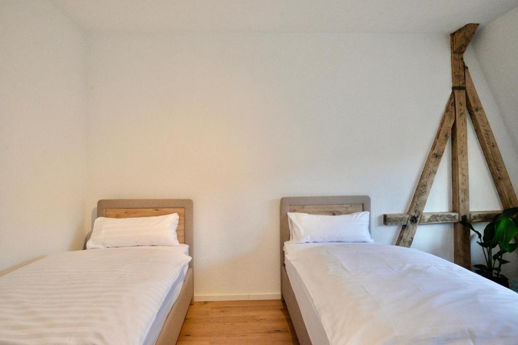 Postel nebo postele na pokoji v ubytování Wohlfühl-Insel in der Altstadt