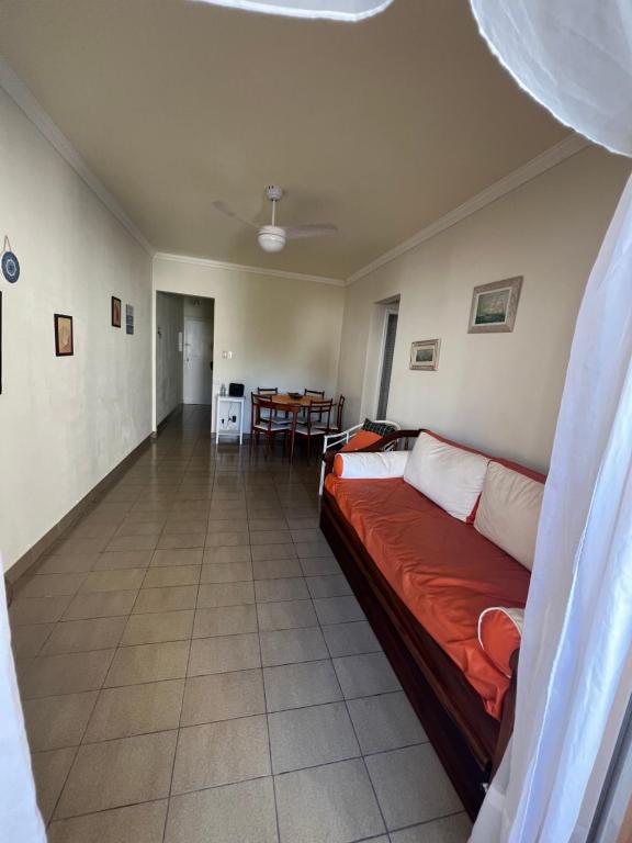 Ένα ή περισσότερα κρεβάτια σε δωμάτιο στο Espaço tranquilo e de lazer em Guarujá