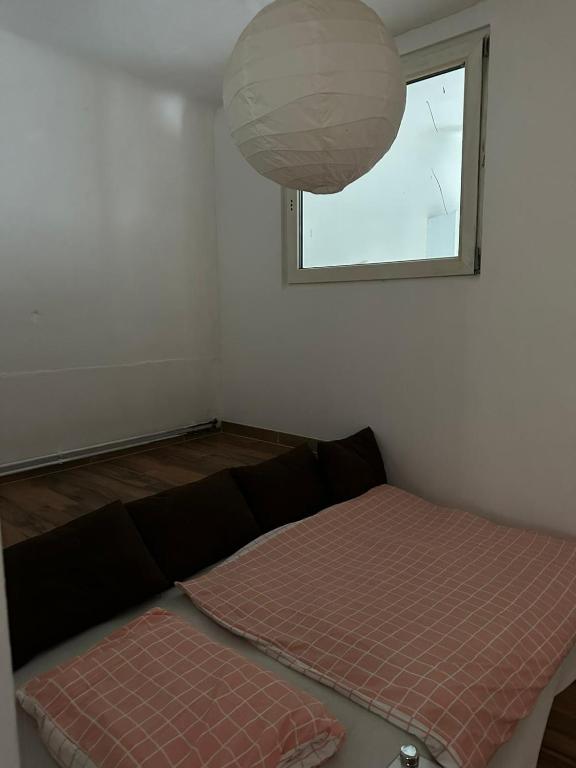 Letto o letti in una camera di Lillys Appartement 3 in 3430 Tulln
