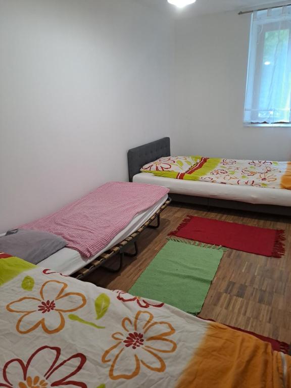 Letto o letti in una camera di Lillys Appartement 3 in 3430 Tulln