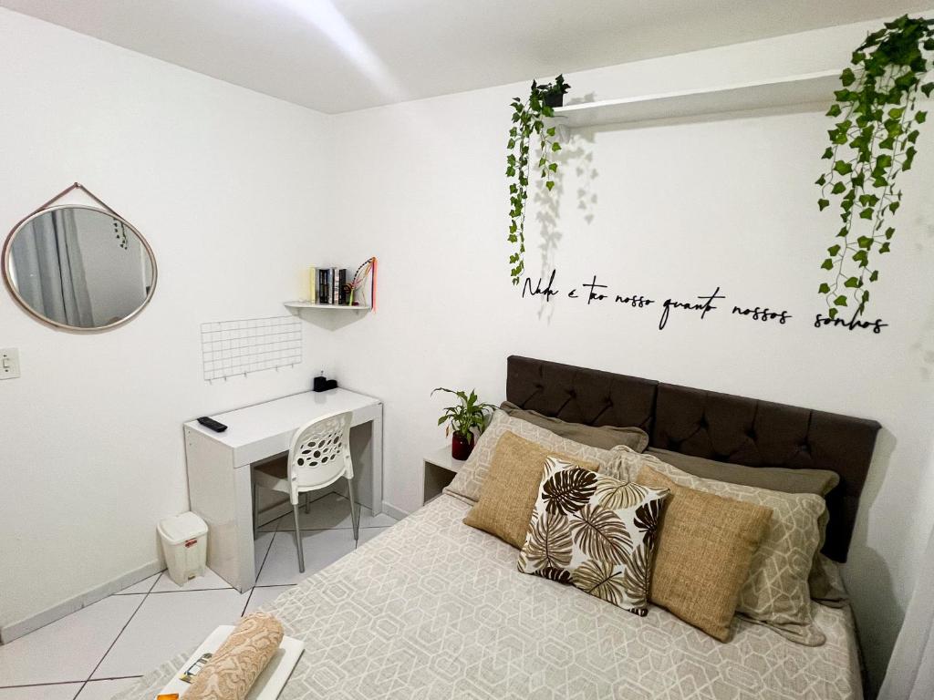 Postel nebo postele na pokoji v ubytování Quarto Encantado