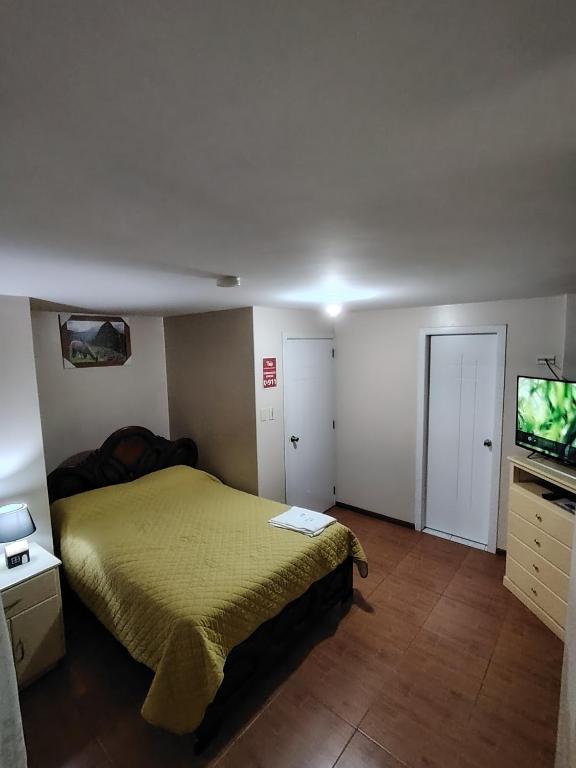 Postel nebo postele na pokoji v ubytování HOTEL CARIBEAN REAL