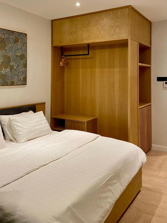 Postel nebo postele na pokoji v ubytování Showcase Hotel Kota Kinabalu