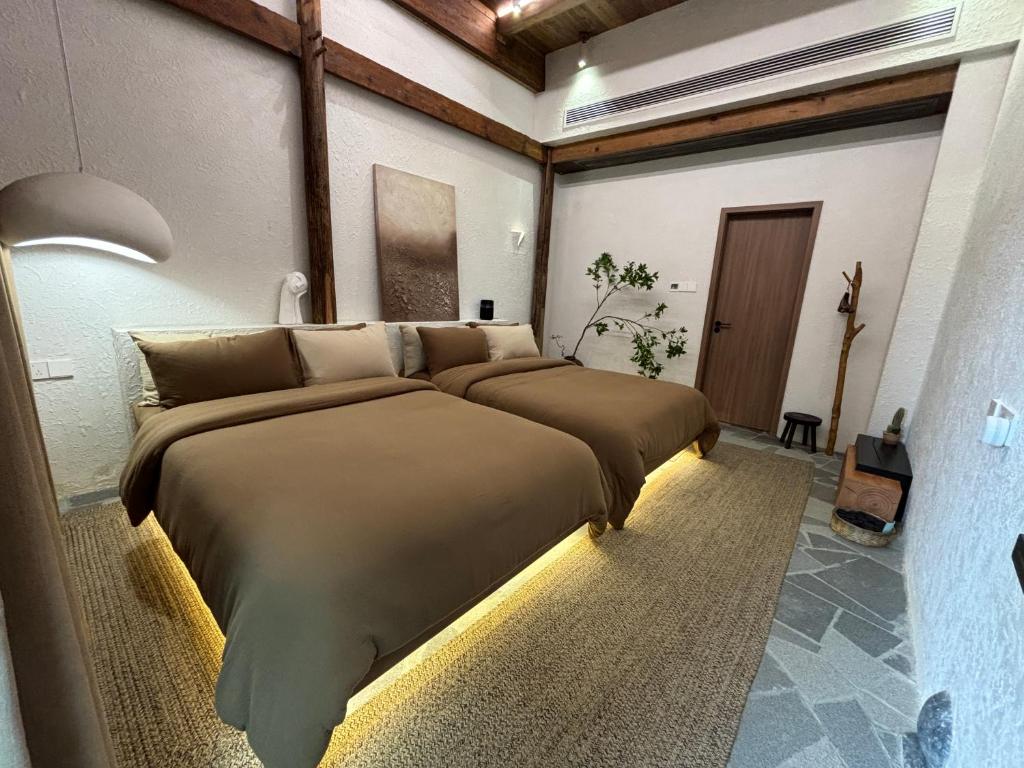 Posezení v ubytování Resort in the valley of Zen 無名川禅意概念酒店