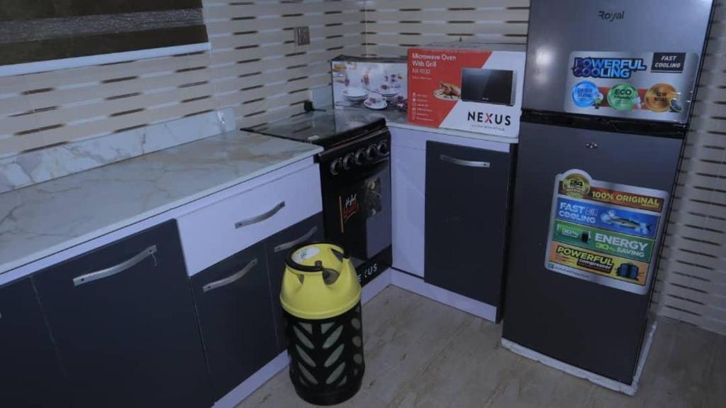 Kuchyň nebo kuchyňský kout v ubytování Bobs-Link Apt