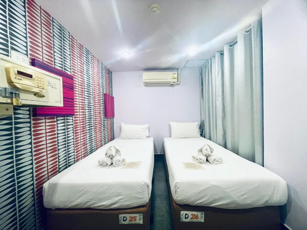 
Single Bed in Dormitory Room
