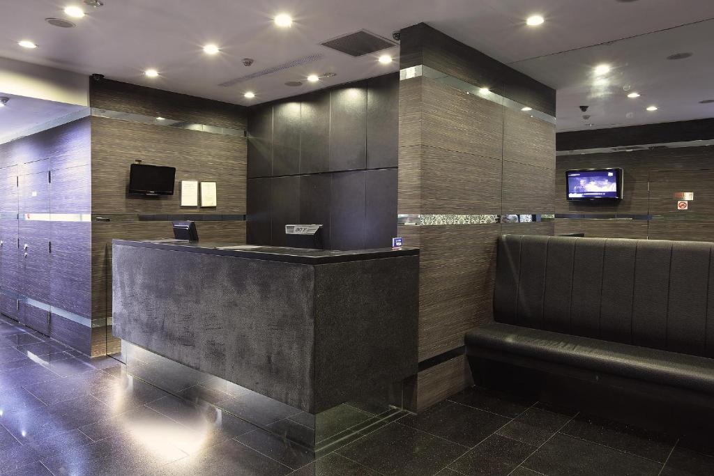 TV a/nebo společenská místnost v ubytování Value Hotel Nice