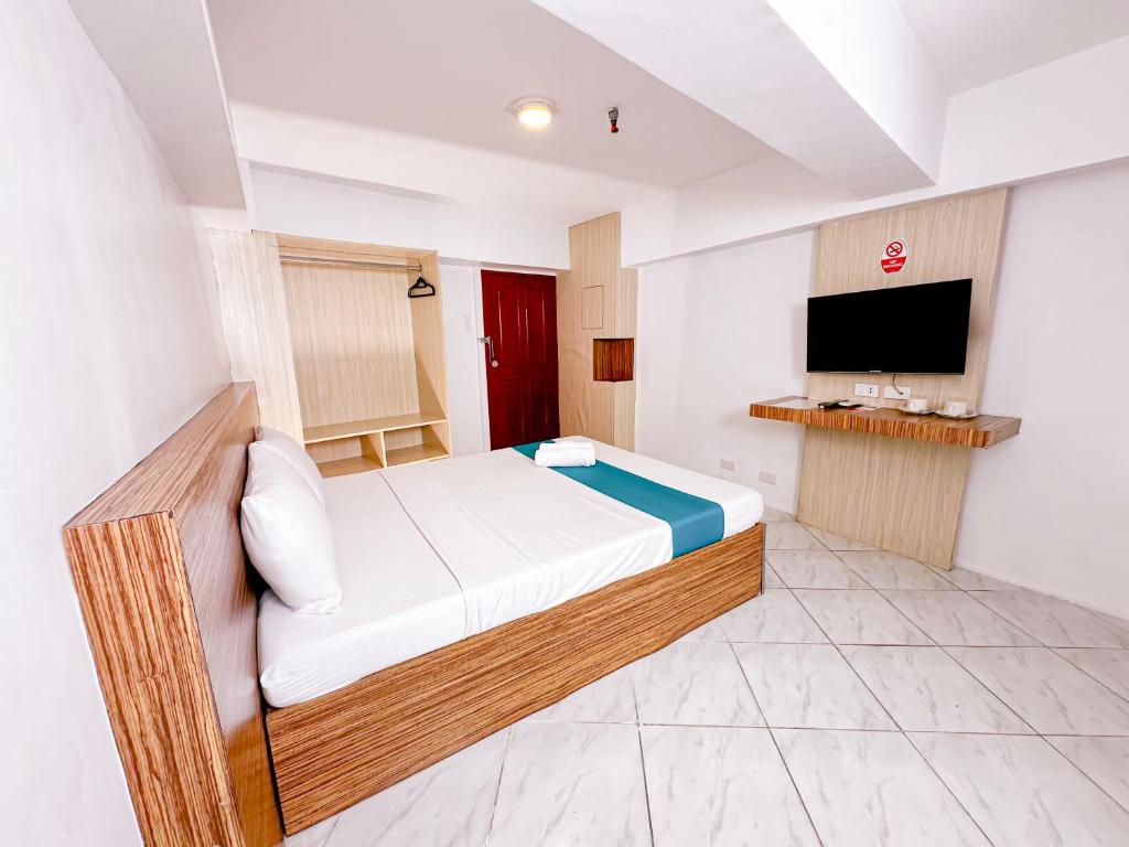 Postel nebo postele na pokoji v ubytování Circuit Hostel