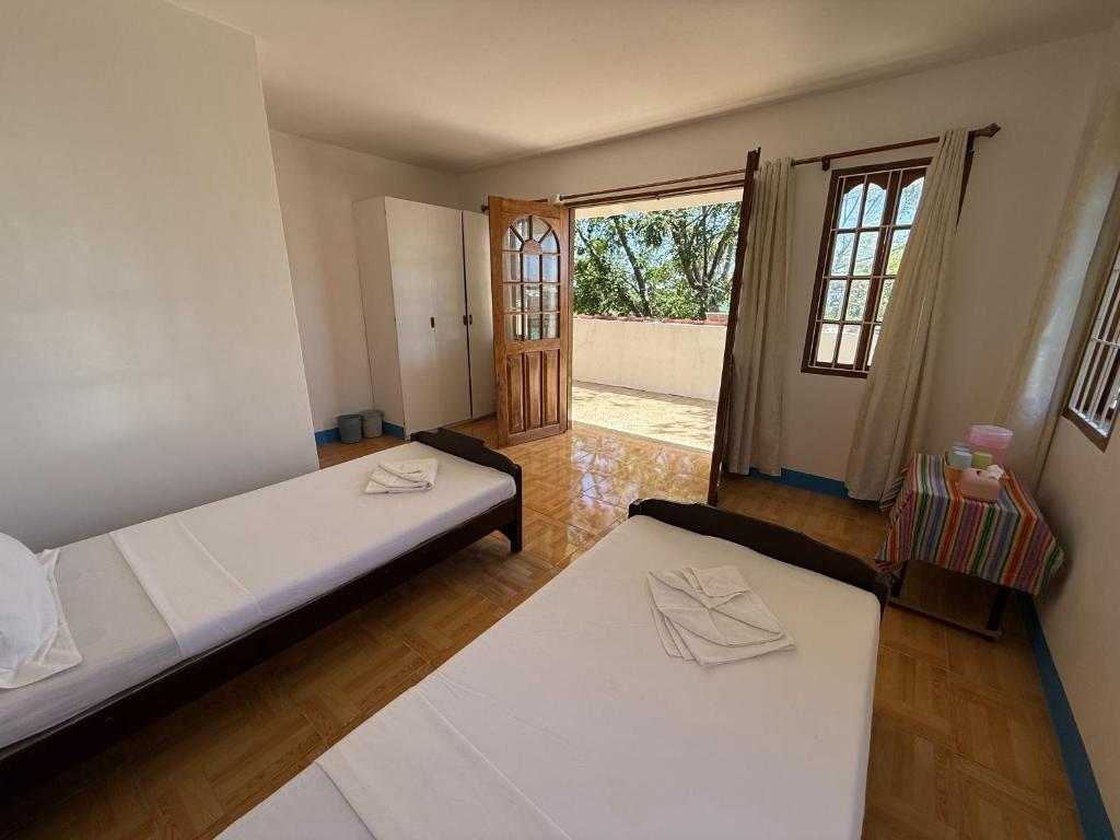 Postel nebo postele na pokoji v ubytování Casa Aureola